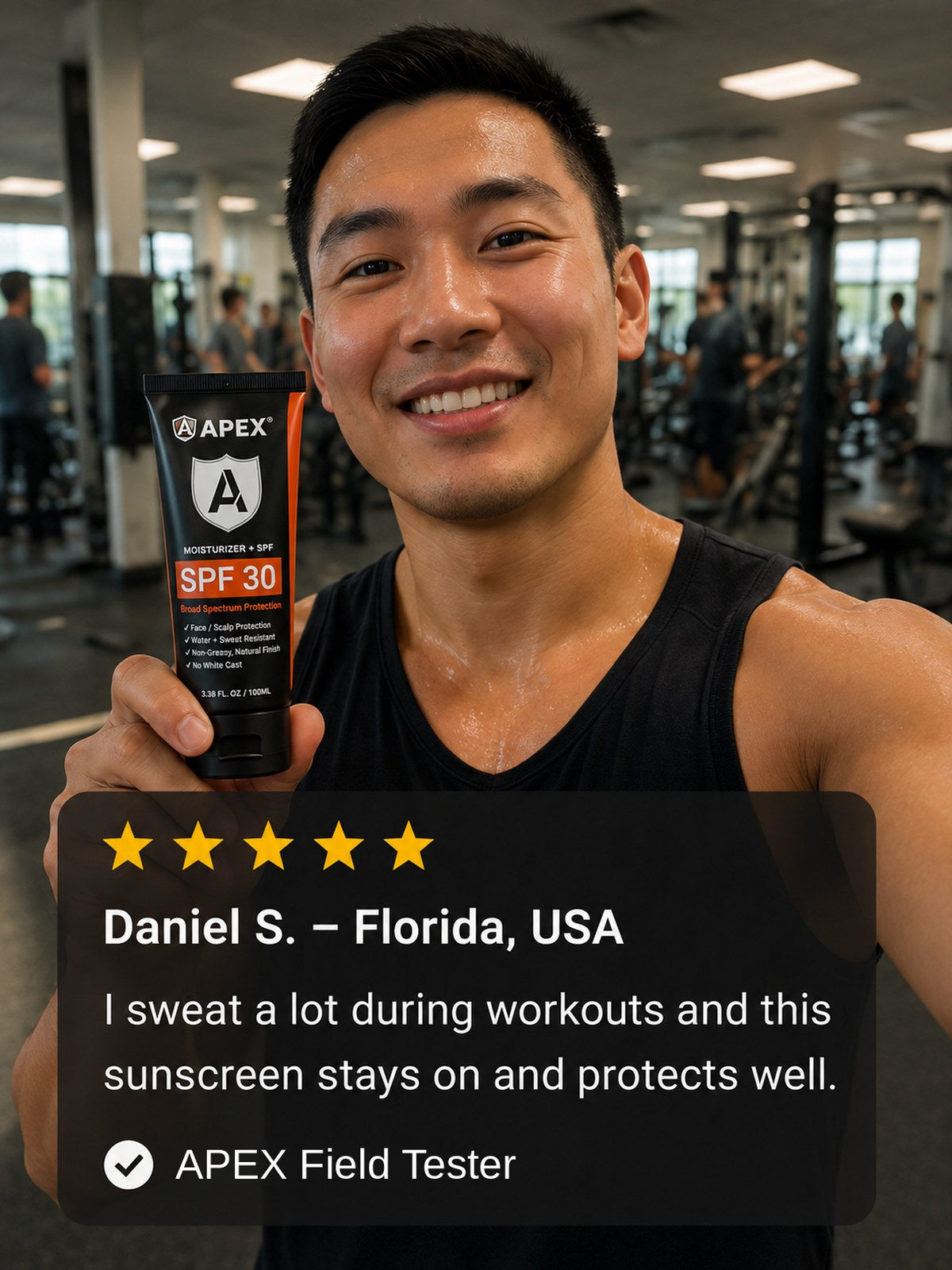 Daniel S. from Florida holding APEX at the gym. His five-star review reads: I sweat a lot during workouts and this sunscreen stays on and protects well.
